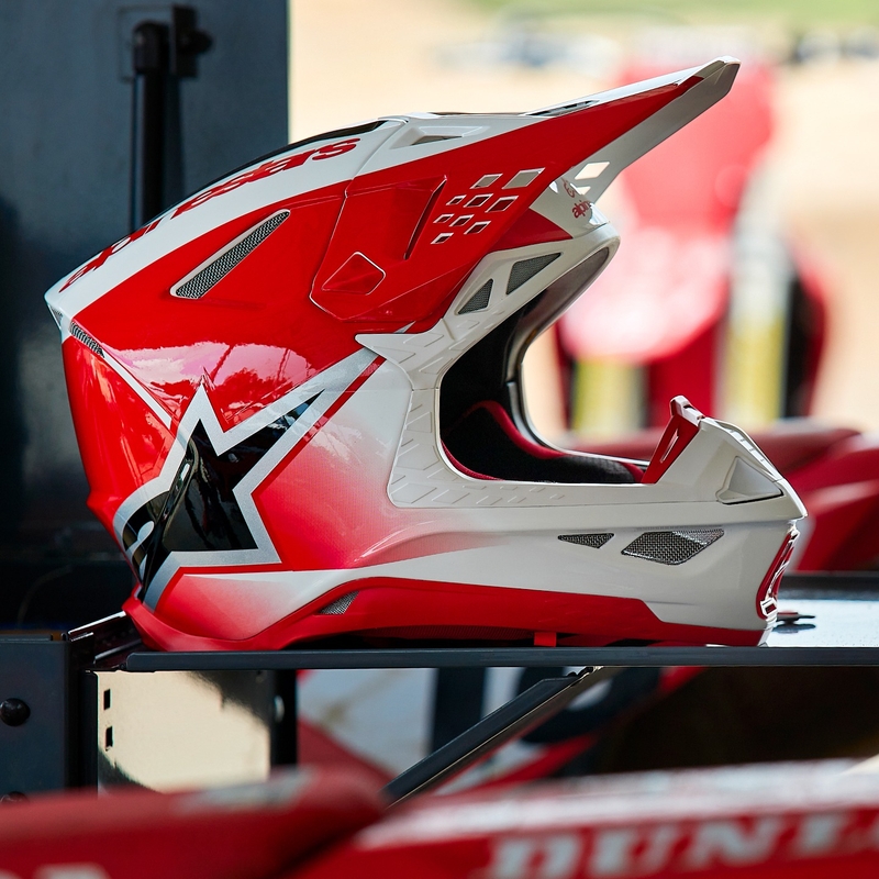 Alpinestars Supertech S-M10 Unite motokros kaciga crveno-bijela
