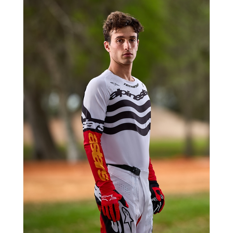 Alpinestars Techstar motocross dres ograničenog izdanja, tamnocrno-bijelo-fluo crveno-narančasta