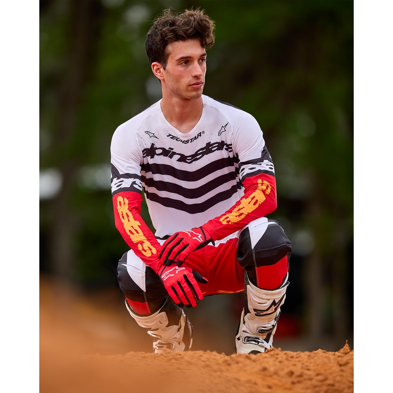 Alpinestars Techstar motocross dres ograničenog izdanja, tamnocrno-bijelo-fluo crveno-narančasta