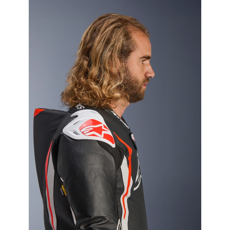 Alpinestars GP TECH V5 jednodijelno kožno motociklističko odijelo crno-bijelo-fluo crveno