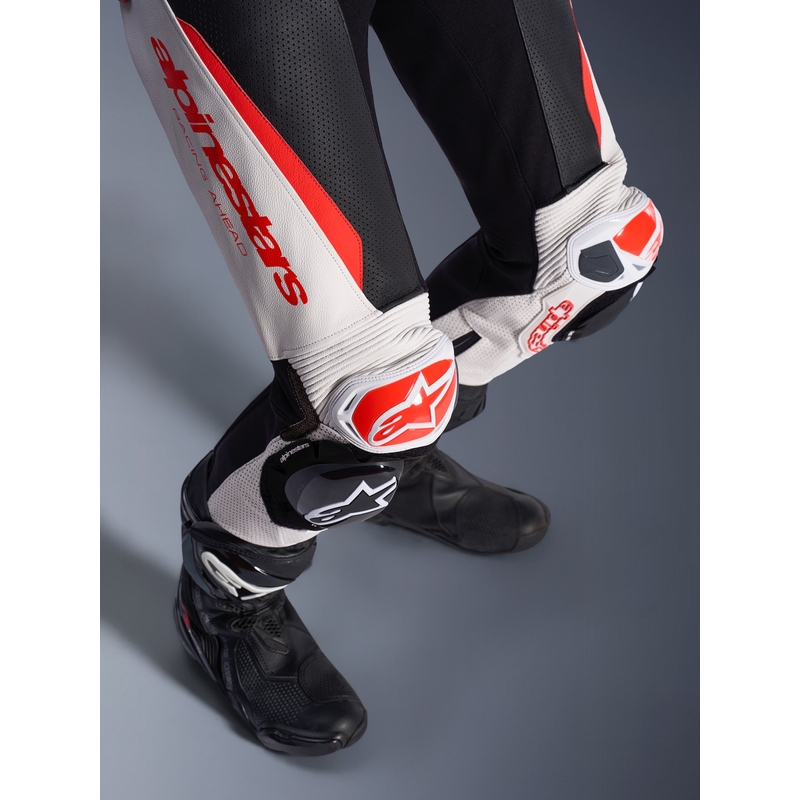Žensko jednodijelno kožno motociklističko odijelo Alpinestars Stella GP-R7 bijelo-fluo crveno-crno